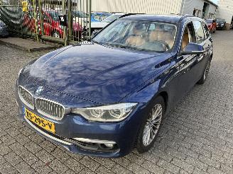 Salvage car BMW 3-serie 320i Automaat Stationcar Luxury Edition 2019/3